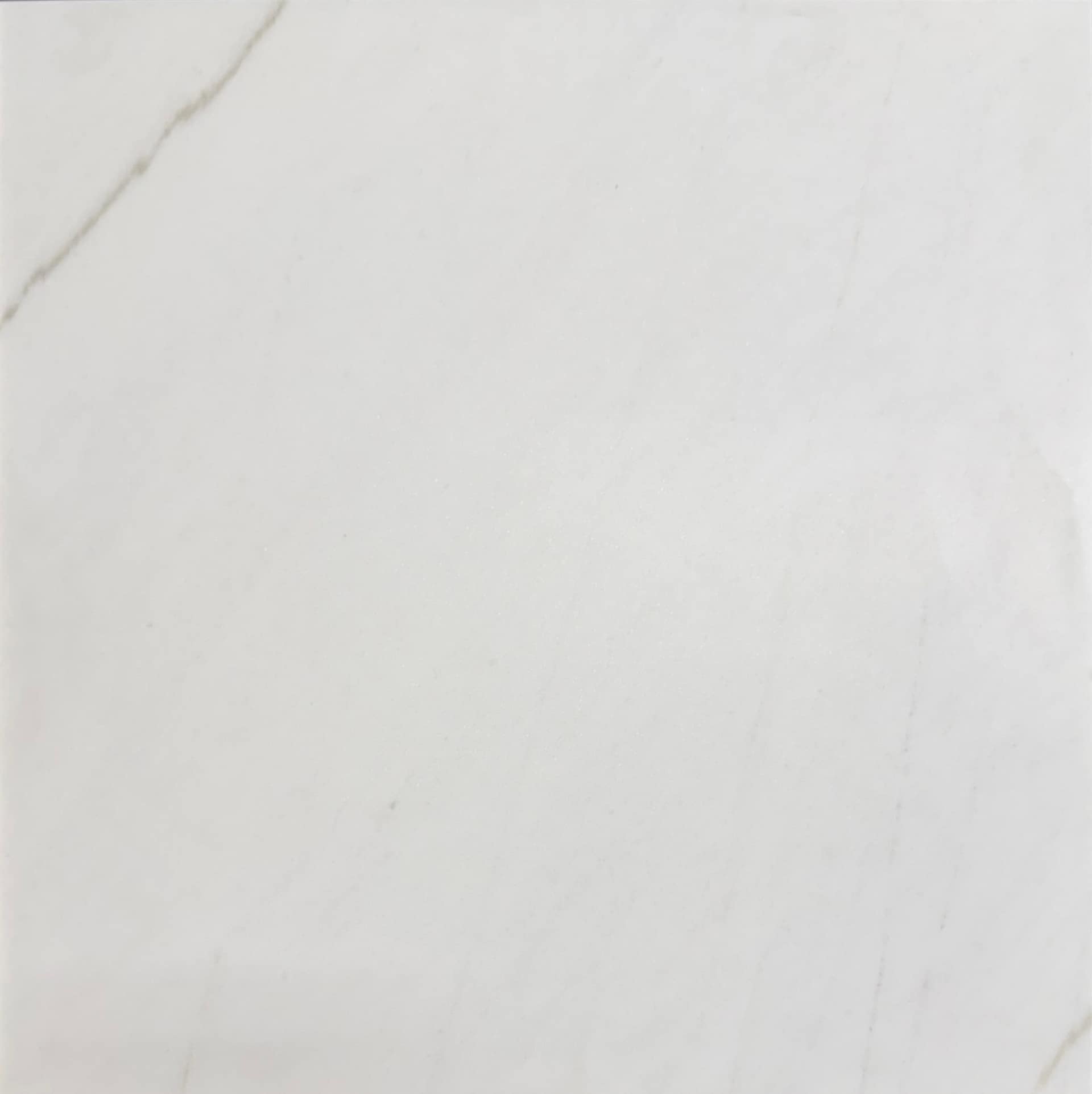 Statuario Colorado marble with bright white background and soft gray veinin